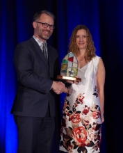 Carole receiving the Wilbur Award