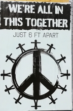 Peace sign styled as a globe with people encircling it; caption, "we're in this together, just 6 feet apart"