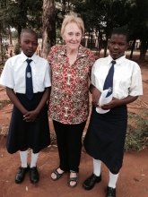 Marg Huber with two students